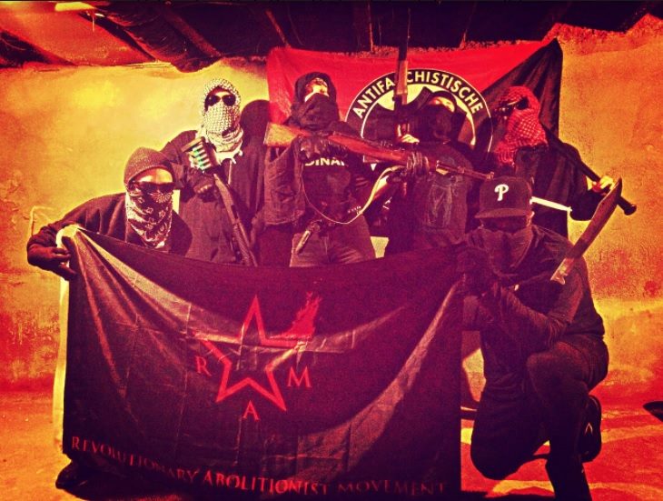 Philadelphia chapter of the Revolutionary Abolitionist Movement (RAM) with Antifa banner.